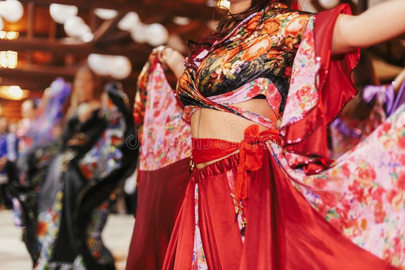 Gypsy dance festival, Woman performing romany dance and folk songs in national clothing. Beautiful roma gypsy girls dancing in