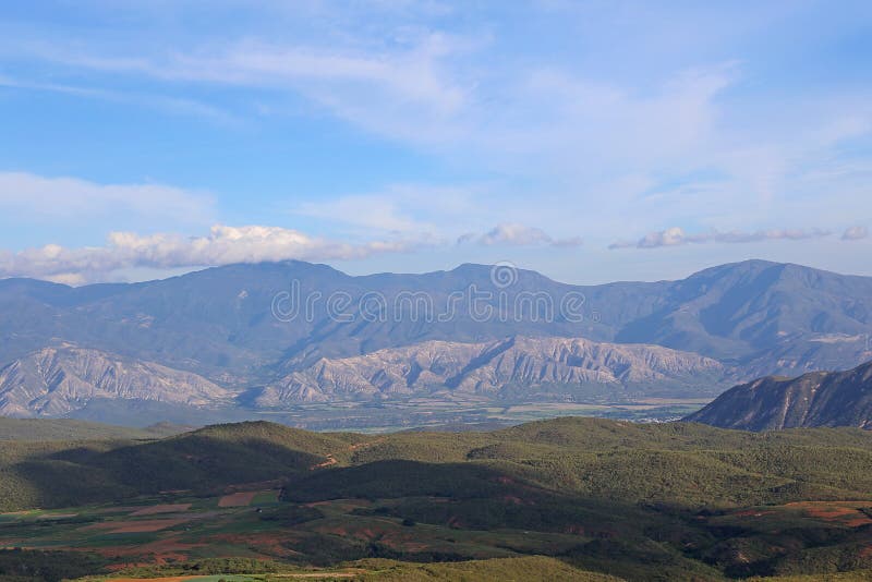 Mountains landscape from the caribean paradise. Blue sky, white clouds and green vegetation. Mountains landscape from the caribean paradise. Blue sky, white clouds and green vegetation.