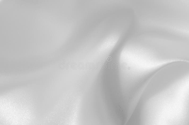 Gładka elegancka biała jedwabiu lub atłasu luksusowa sukienna tekstura Może używać jako ślubny tło obrazy royalty free Gładka elegancka biała jedwabiu lub atłasu luksusowa sukienna tekstura Może używać jako ślubny tło obrazy royalty free