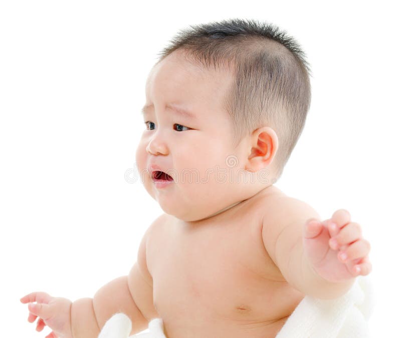 Hungry Asian baby boy crying, sitting isolated on white background. Hungry Asian baby boy crying, sitting isolated on white background