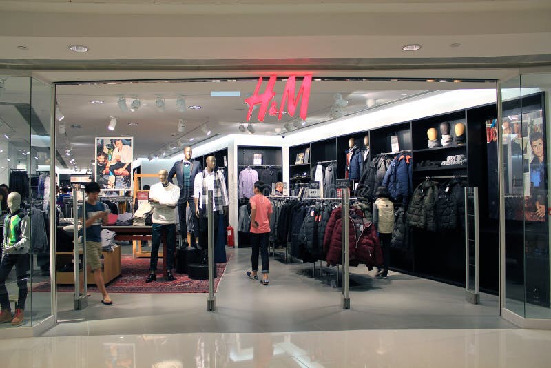 H en m-winkel in Hongkong stock afbeelding H en m-winkel in Hongkong stock afbeelding