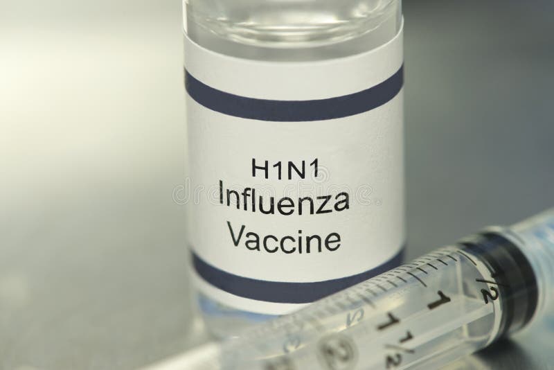 H1N1 Vaccin och spruta royaltyfria bilder H1N1 Vaccin och spruta royaltyfria bilder