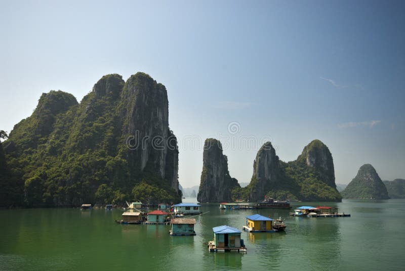 Ha Long Bay is a UNESCO World Heritage Site, and a popular travel destination. Floating fishing village. Ha Long Bay is a UNESCO World Heritage Site, and a popular travel destination. Floating fishing village.