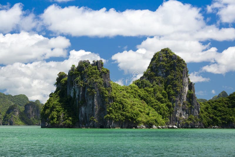 Scenic view of Limestone Karsts in Ha Long Bay under blue sky and cloudscape, Vietnam.
