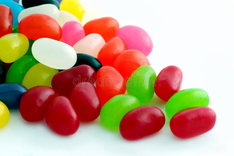 Multi-colored jelly beans, on a white background. Multi-colored jelly beans, on a white background