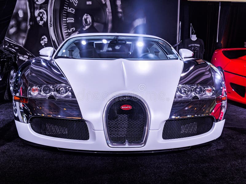 White and chrome bugatti sitting on display at the canadian international autoshow in toronto ontario. White and chrome bugatti sitting on display at the canadian international autoshow in toronto ontario