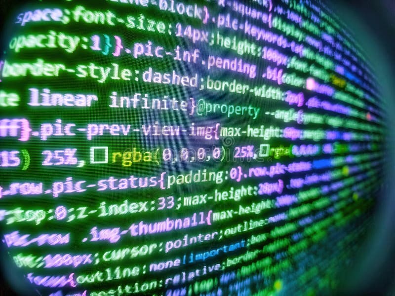 Hacker breaching net security. Selective focus effect. Screen of web developing javascript code. Writing programming code on stock photos