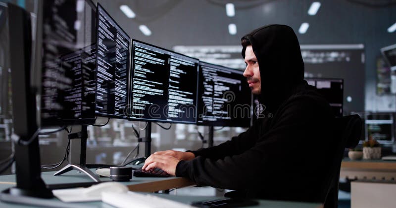Hacker And Computer Data Breach stock photography