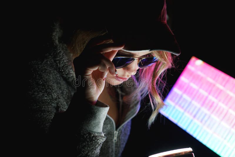 Hacker Girl in Cap and Sunglasses in Front of a Computer in Neon Light  Stock Photo - Image of hacker, hipster: 144314162