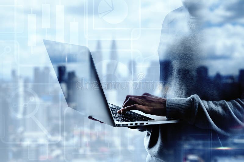 Hacker hands with laptop stock photos