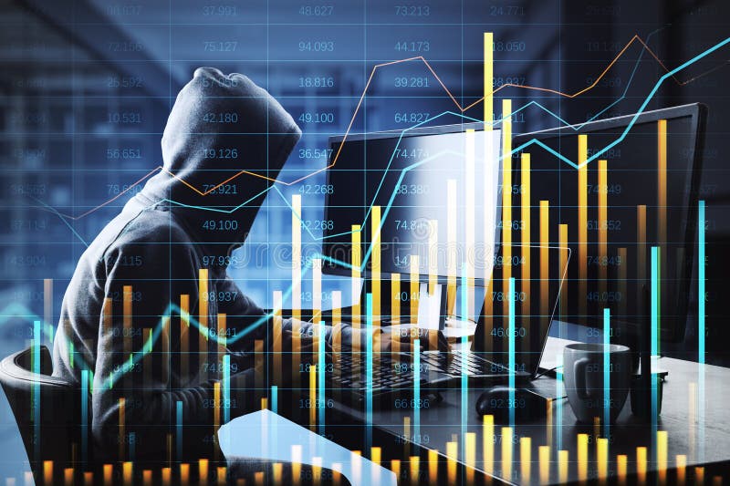 Hacker in a hoodie typing on a laptop with financial charts and data overlays royalty free stock photo