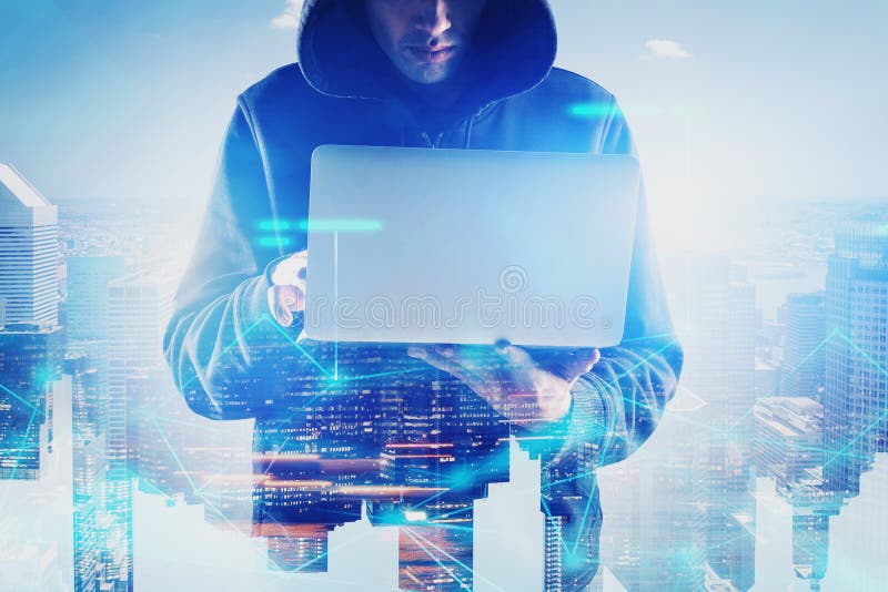 Hacker with laptop in city, network interface stock photo