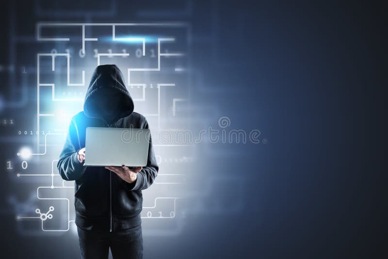 Hacker with laptop, cyber security stock photography