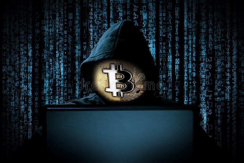 Hacker med bitmyntbaserad ansiktsmask bakom den bärbara datorns framsida framför den blå källans binära bakgrundskryptering Intern fotografering för bildbyråer