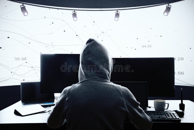 Hacker mit Computern stockfotografie