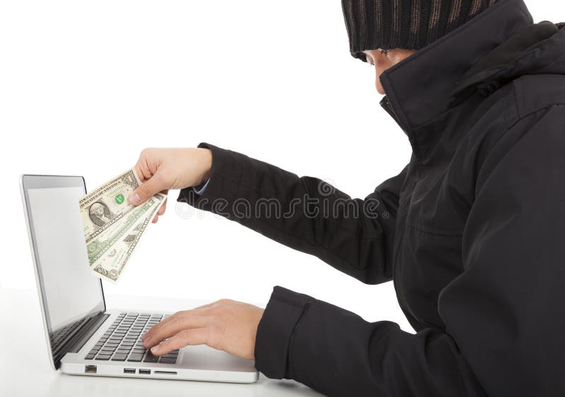 Hacker stehlen Geld vom Internet mit Laptop stockfotos