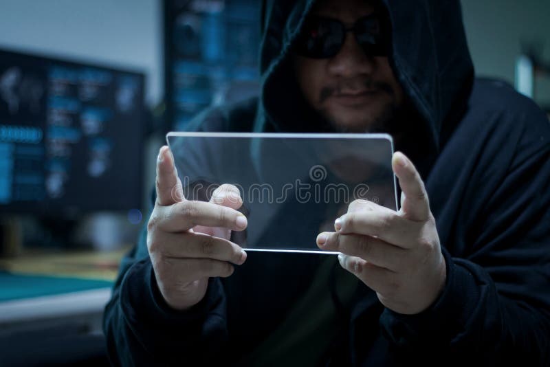 Hacker Using Blank Clear Glass Tablet with Blue Dark and Grain P Stock