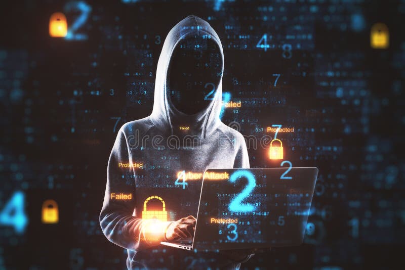 Hacker using laptop stock image