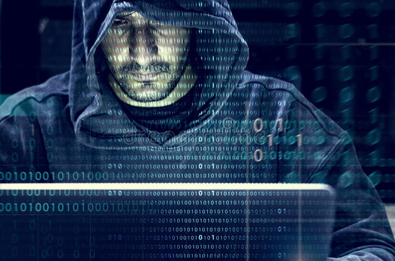 Hacker working on computer cyber crime stock photography