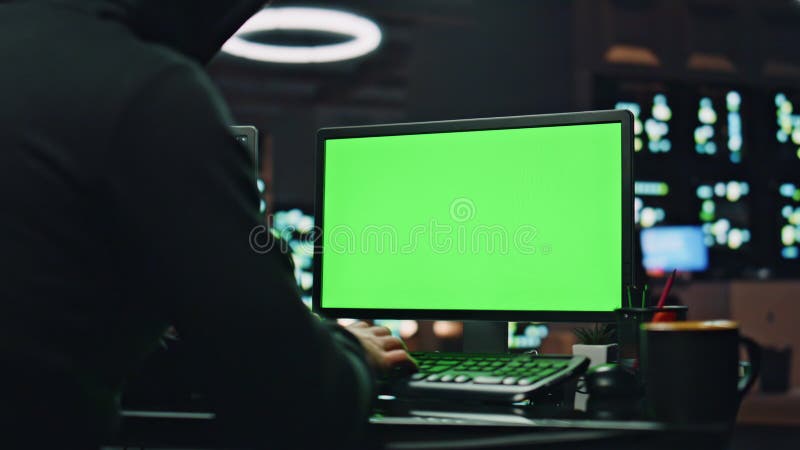 Hacker writing data chroma key computer in night room closeup. Programer working royalty free stock photo