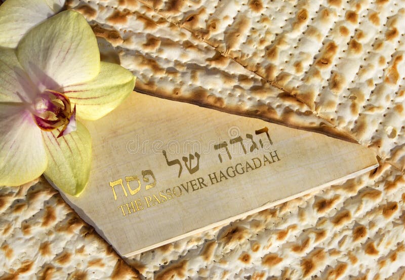 Spring holiday of Passover and its attributes, with matzo and Haggadah in hebrew and english - Happy Passover. Spring holiday of Passover and its attributes, with matzo and Haggadah in hebrew and english - Happy Passover