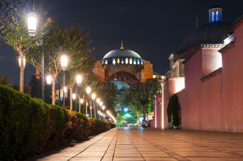Hagia Sophia at night in Istanbul, Turkey. The ancient Hagia Sophia, once a cathedral and an Ottoman mosque and now a museum, illuminated at night in Sultanahmet stock photo Hagia Sophia at night in Istanbul, Turkey. The ancient Hagia Sophia, once a cathedral and an Ottoman mosque and now a museum, illuminated at night in Sultanahmet stock photo