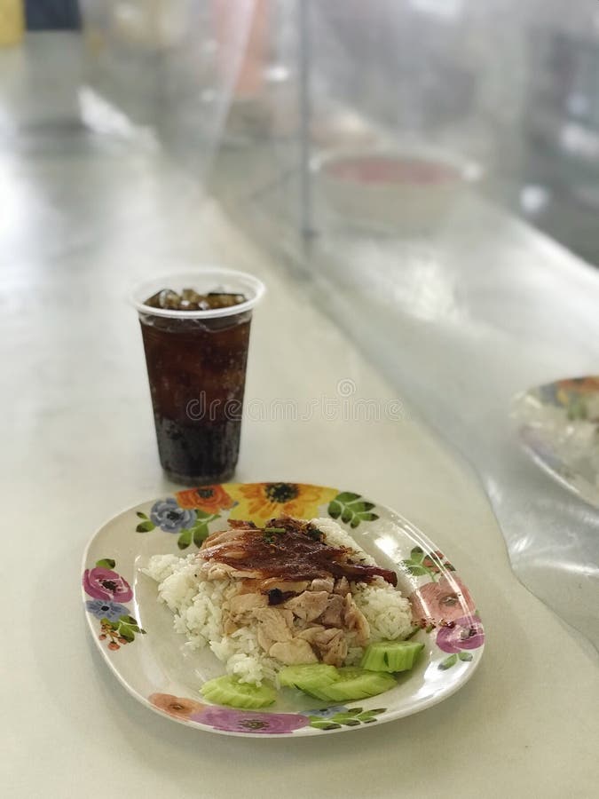 Hainanese Chicken Rice, Grill Chicken and White Rice Stock Photo