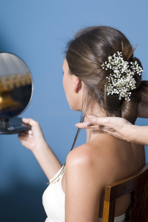 Hair art on the back of a young bride