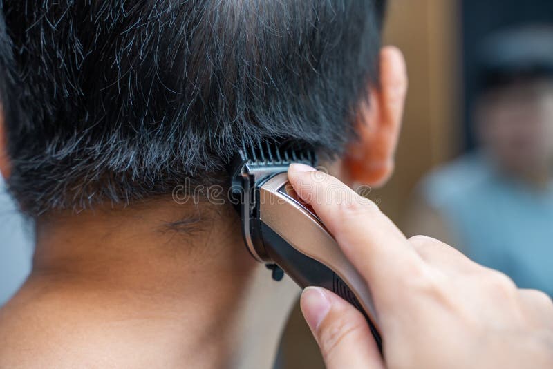 Hair cut by myself at home stock photo. Image of mirror 187319280