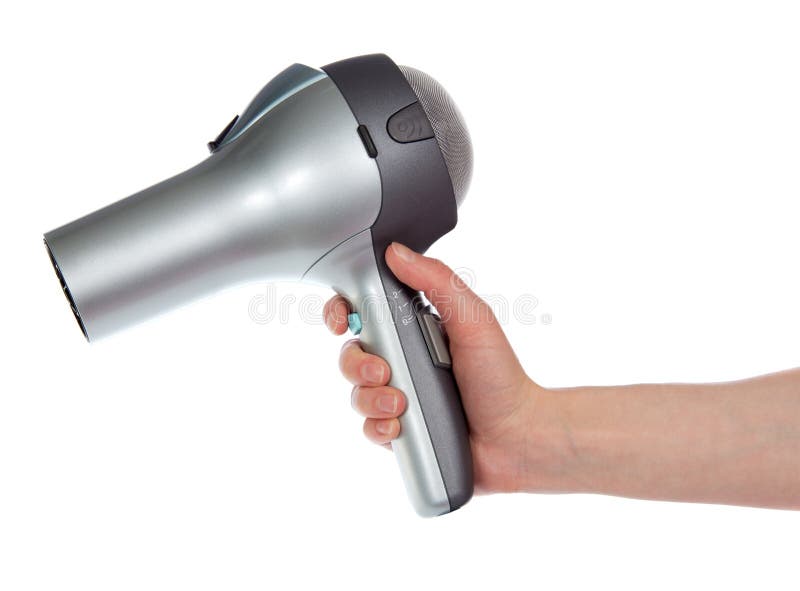 The hair dryer in a hand stock photo. Image of curls 35404342