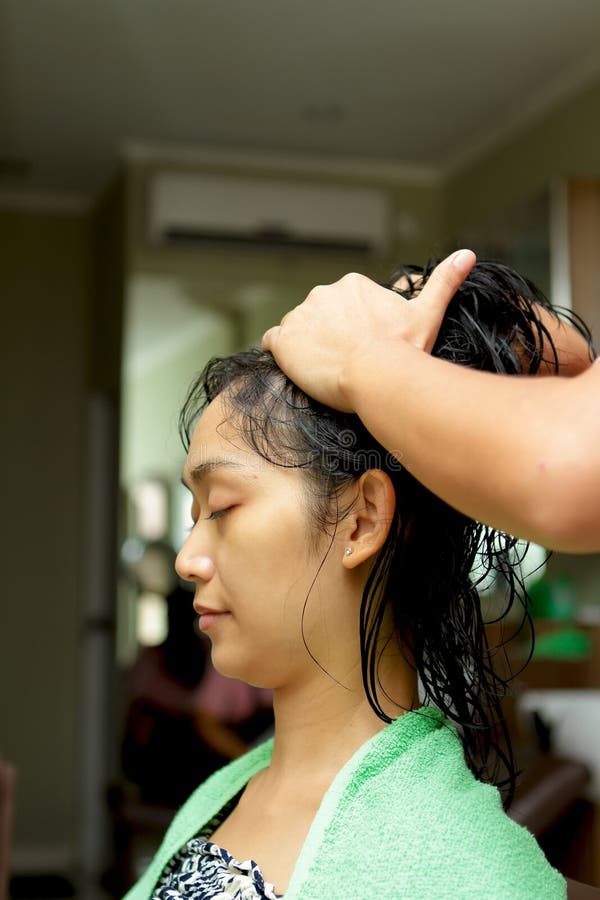 Hair massage at hairdressing salon