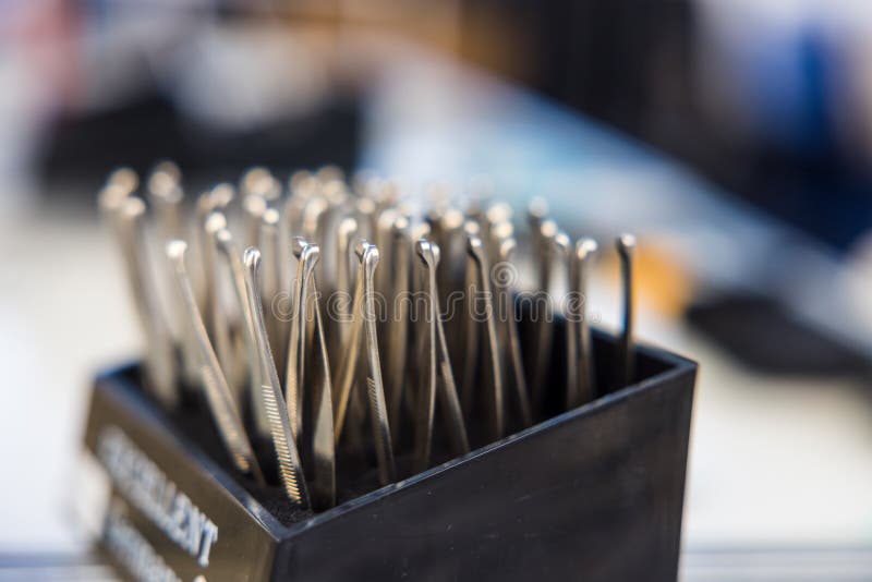 Hair Puller Tools on a Display Rack for Sale Stock Image Image of