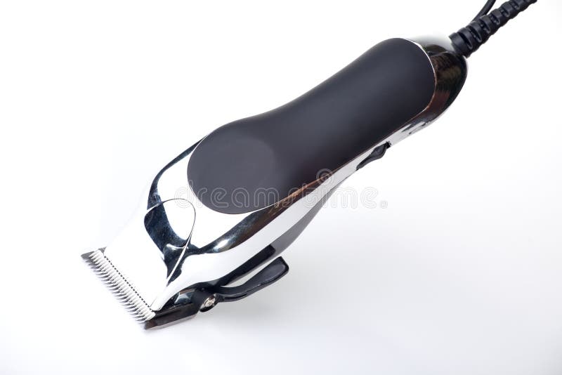 Detailní kadeřnictví hair trimmer na bílém.