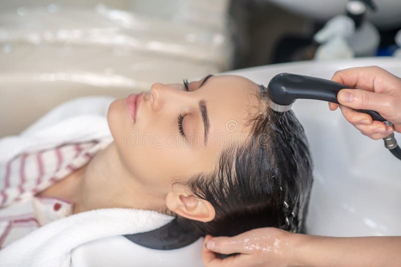 Hair Stylist Rinsing Hair of Her Client Stock Image Image of lifesyle