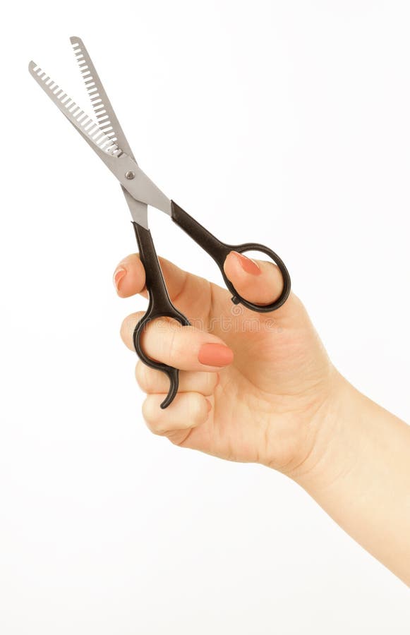 Hairbrush in the hand royalty free stock image