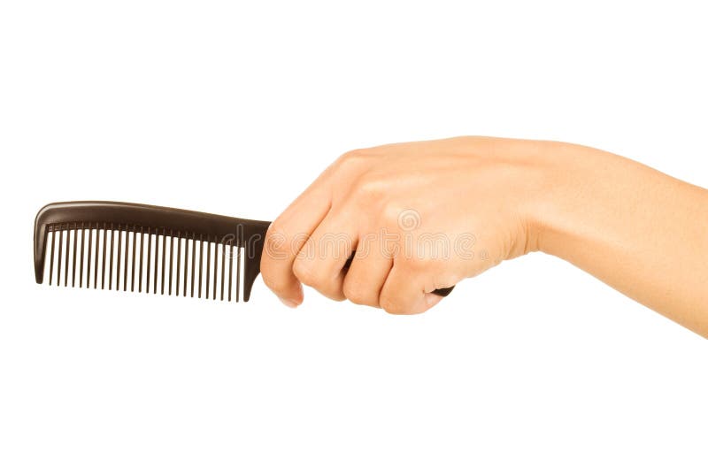 Hairbrush in the hand royalty free stock photo