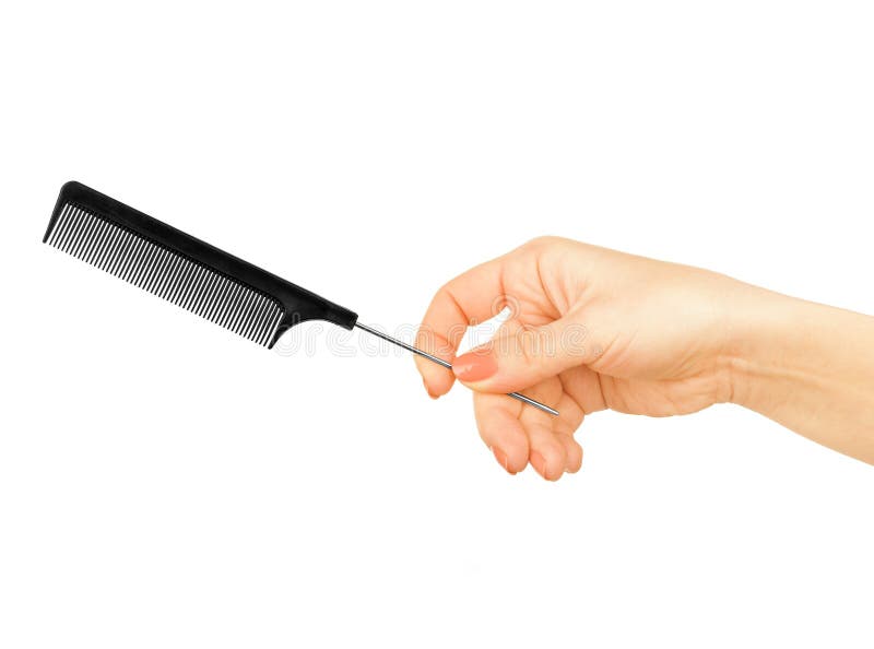 Hairbrush in the hand royalty free stock photo