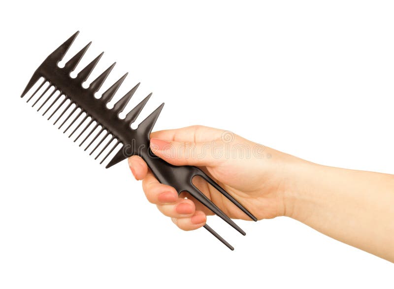 Hairbrush in the hand royalty free stock image