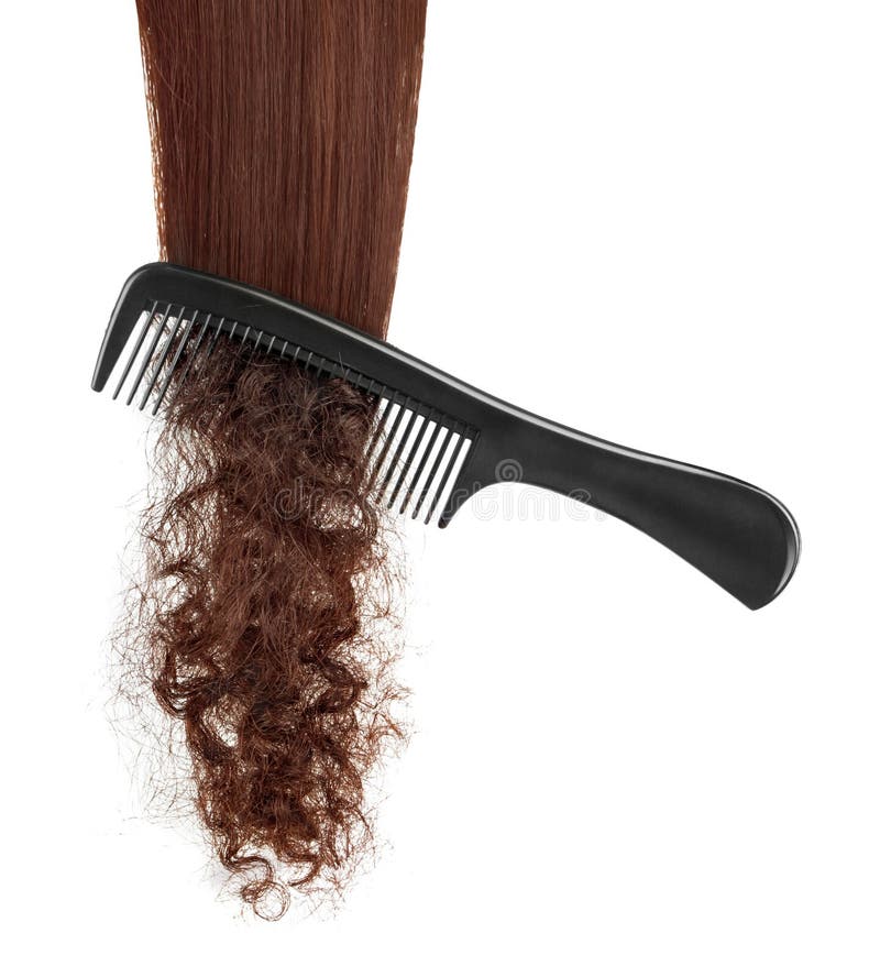 Hairbrush and lock of hair stock images