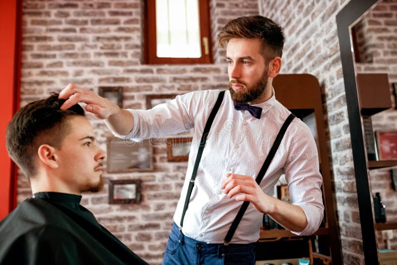 Hairdresser Adjusts Hair a Customer with a Gel Stock Photo - Image of  hairdresser, moustache: 120975116