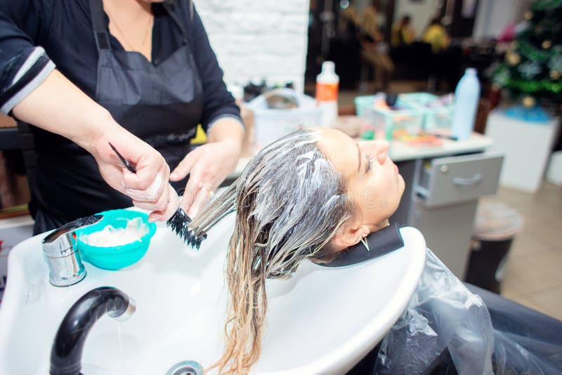 Master Hairdresser Applies Cream or Mask To Client`s Hair in Beauty Salon  Stock Photo - Image of sink, care: 213090106