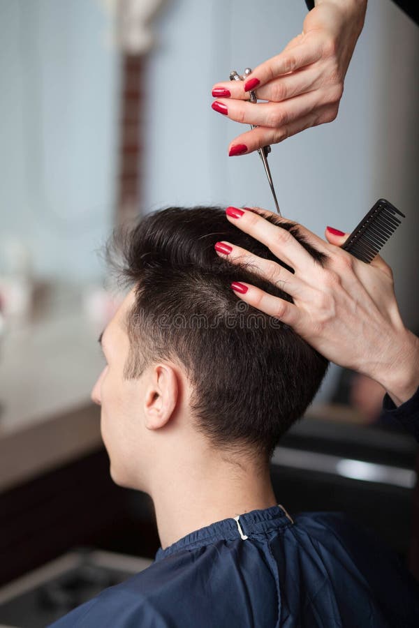 Hairdresser Cutting Man`s Hair with Scissors Stock Image - Image of trim,  start: 134994005