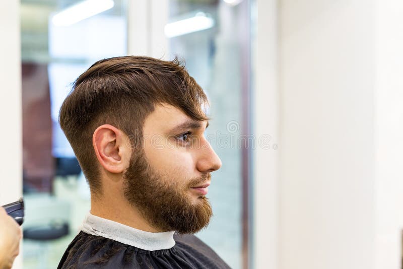 Hairdresser Doing Haircut for Male Client, Man with Beard Using  Professional Hairdresser Tools, Equipment on Hairdresser Work Stock Photo -  Image of handsome, beard: 172131238