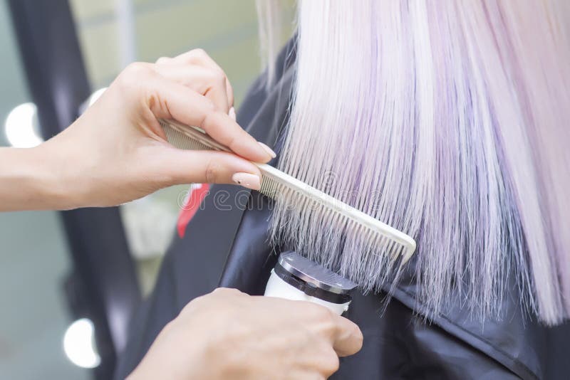 Hairdresser with a Hair Machine. Cutting Off Split Ends of Hair with a Clipper. Close Up Stock Photo - Image of blonde, close: 171783232 Hairdresser with a Hair Machine. Cutting Off Split Ends of Hair with a Clipper. Close Up Stock Photo - Image of blonde, close: 171783232