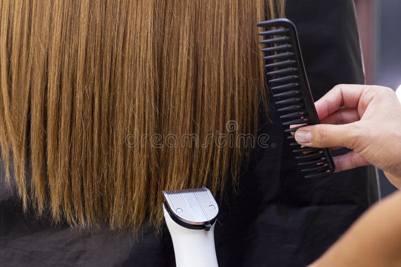 Trimming split ends stock image. Image of handsome, cutting - 201423923 Trimming split ends stock image. Image of handsome, cutting - 201423923