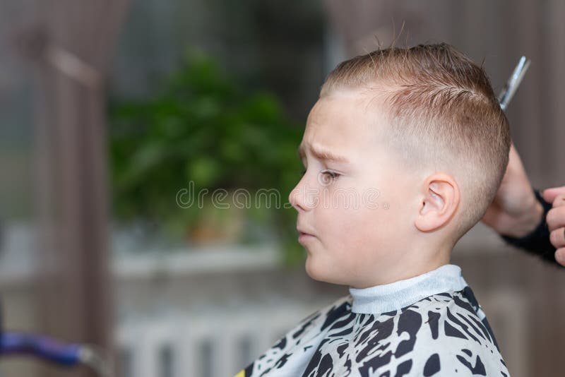 Side View Hairdresser Makes a Stylish Hairstyle. the Woman is Standing and Making Haircut for Blonde Boy Stock Photo - Image of salon, fashion: 196476964 Side View Hairdresser Makes a Stylish Hairstyle. the Woman is Standing and Making Haircut for Blonde Boy Stock Photo - Image of salon, fashion: 196476964