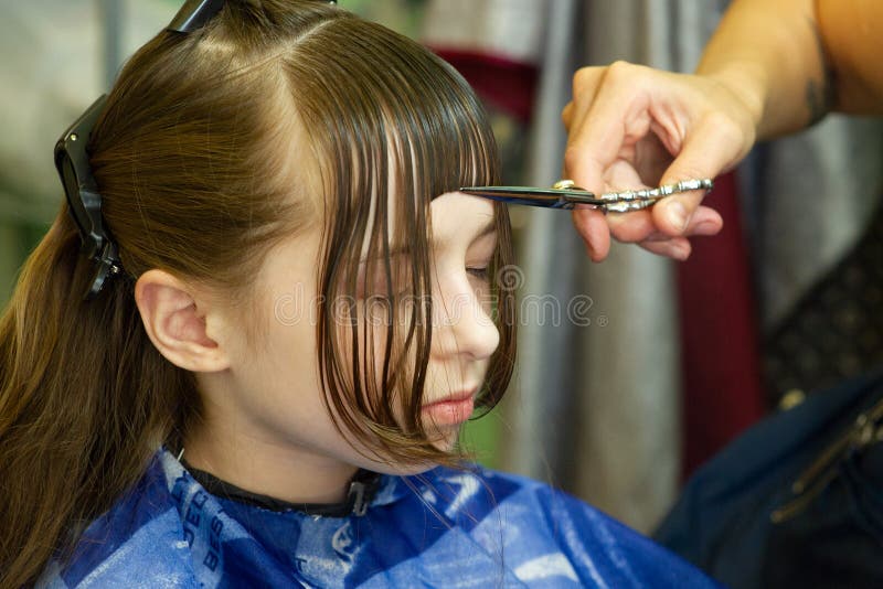 Hairdresser Making a Hair Style To Cute Little Girl Stock Image - Image of  face, haircutting: 152415005