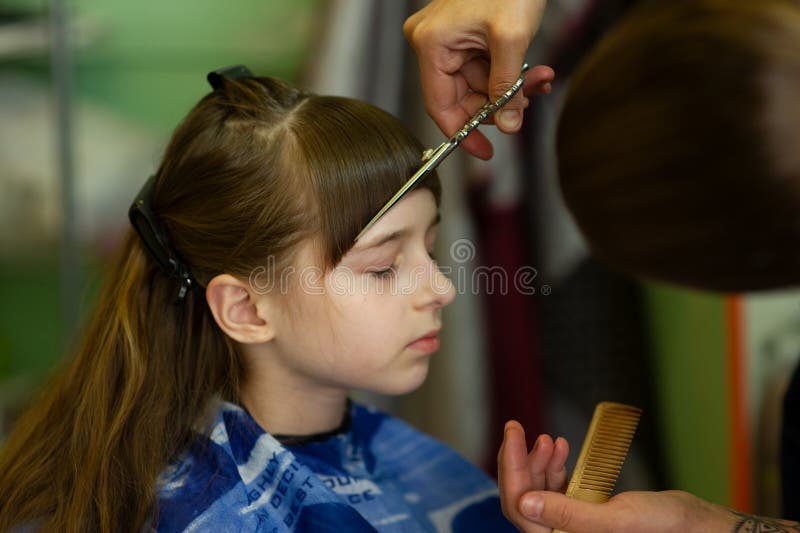 Hairdresser Making a Hair Style To Cute Little Girl Stock Image - Image of  girl, hairbrush: 152415143