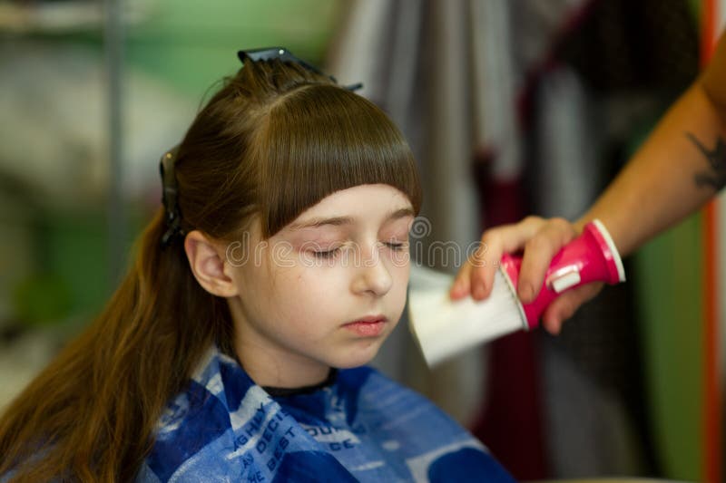Hairdresser Making a Hair Style To Cute Little Girl Stock Photo - Image of  head, haircut: 152415284
