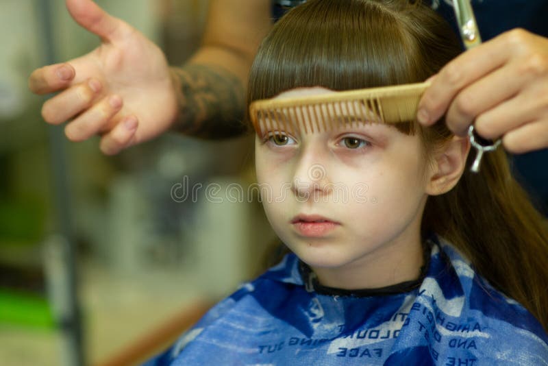Hairdresser Making a Hair Style To Cute Little Girl Stock Photo - Image of  haircut, hairstyle: 152415312